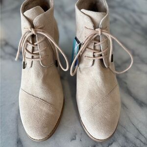 Tom’s Hyde sand colored lace up ankle boots with wedge heel. Size 10 never worn.